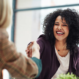 Professional woman shaking hands